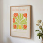 Orange tulips poster styled in bright kitchen with modern botanical decor